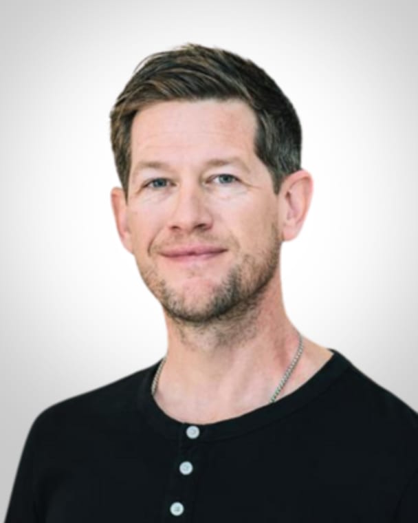 Portrait photo of Travis Abbott
