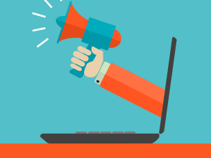 An image of a hand holding a speakerphone projecting out of a laptop screen.