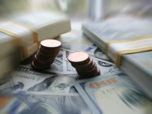 Stacks of money on table