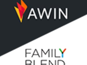 two people sitting at a table with food