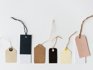 Shopping tags in front of a white background