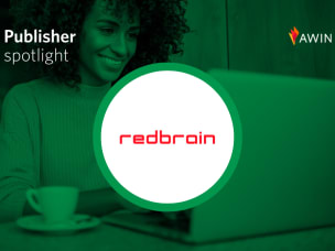 Publisher spotlight featuring Redbrain logo and person working on a laptop