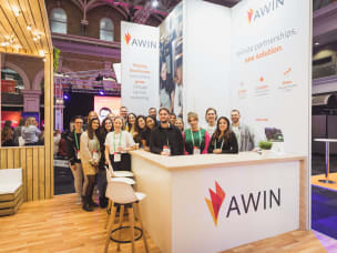Awin employees at an event amid winning UK Top 50 Best Places to Work 