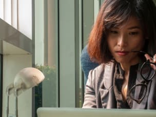 Person reading through how the voucher and coupon space needs regulation
