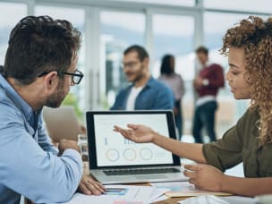 Business employees using Awin's new platform features to run successful campaigns