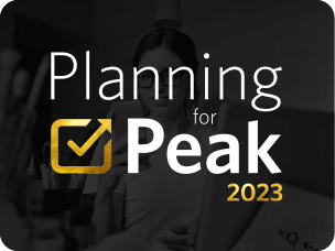 Person planning for Black Friday 2023 with Awin's small business marketing tips