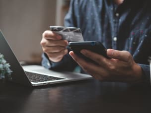 Person online shopping, shedding light on Awin's predictions on the key trends for Cyber Shopping Week