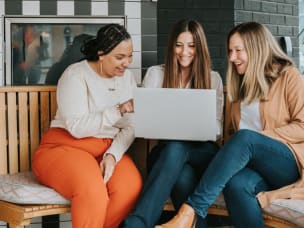 People around a laptop