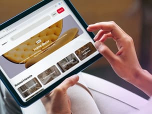 Person browsing a Pinterest home decor board on a tablet
