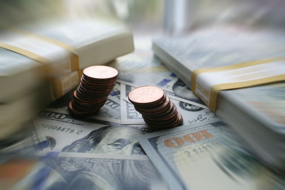 Stacks of money on table