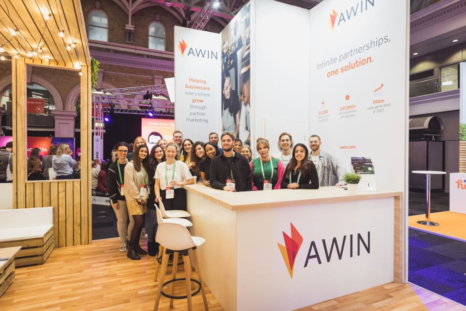 Awin employees at an event amid winning UK Top 50 Best Places to Work 