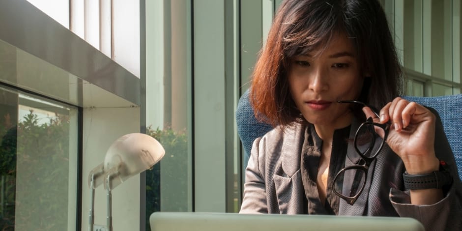 Person reading through how the voucher and coupon space needs regulation