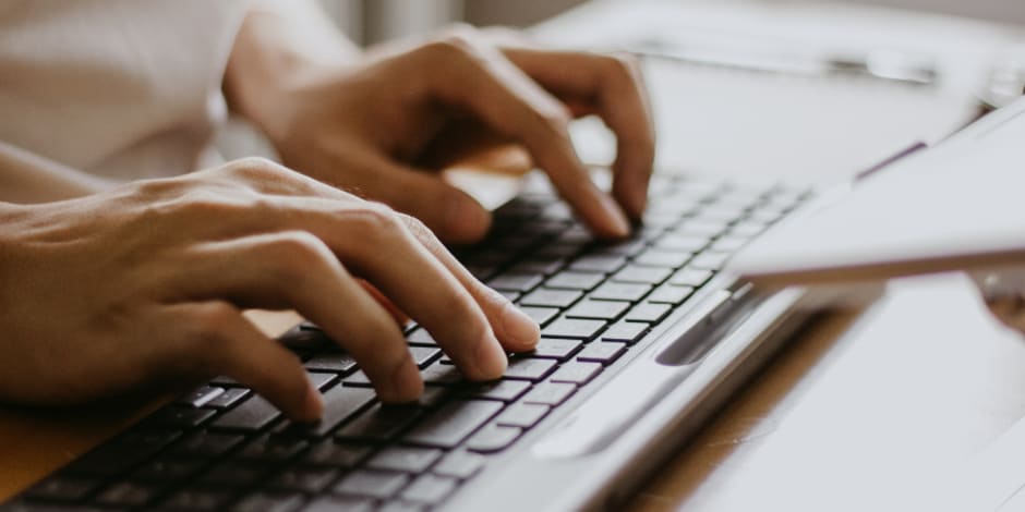 Fingers typing on keyboard for the new Google Ads privacy measures