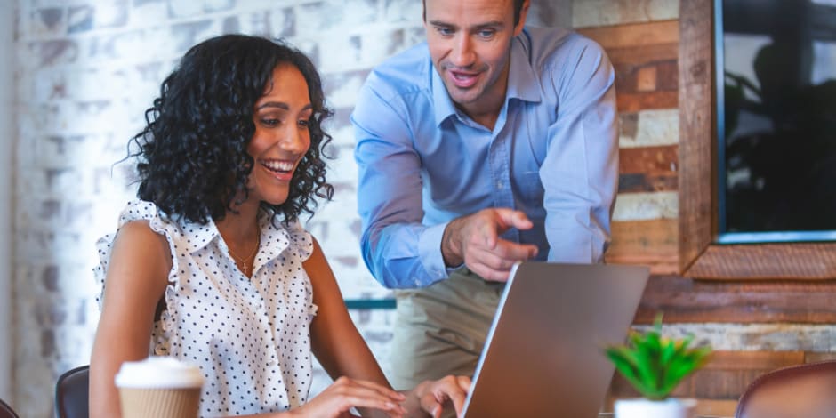 Two people collaborating at desk
