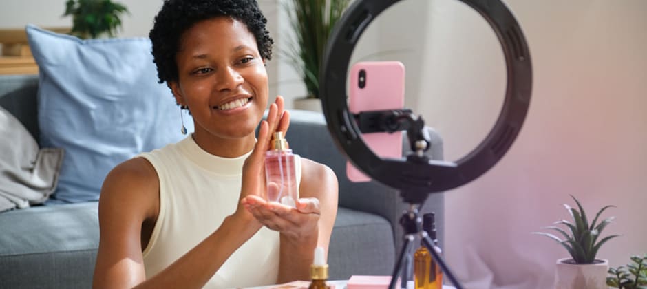 Creator filming a product demo on a phone at home