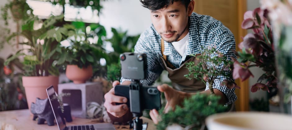 Creator filming a product on a phone at home