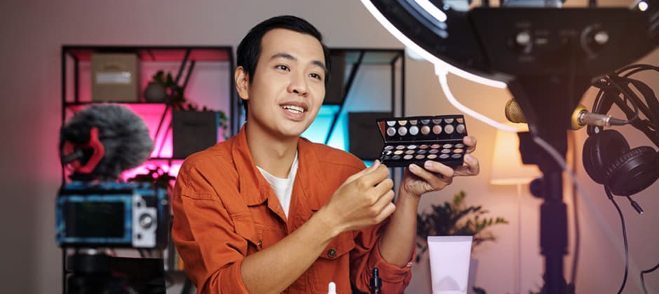 Creator filming a product review with a camera on a tripod
